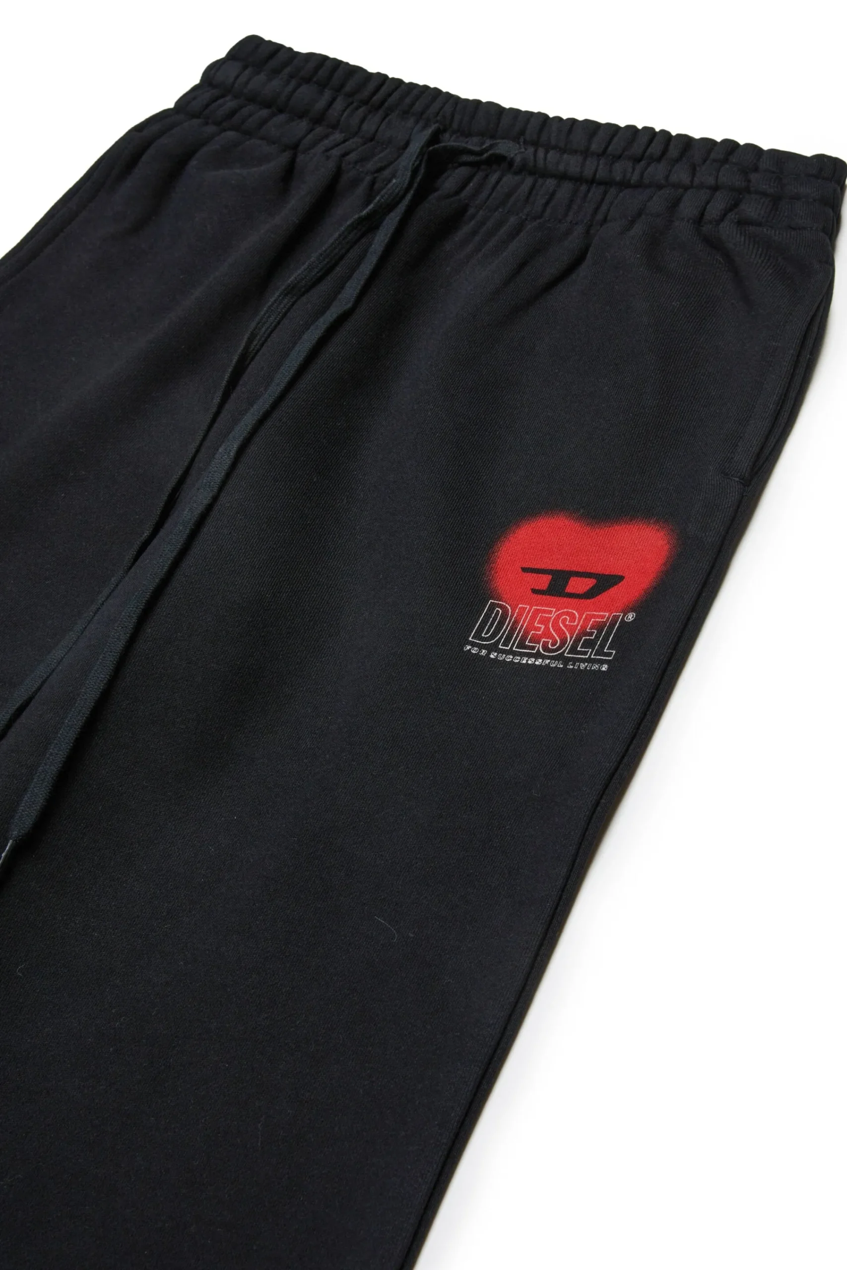 Pants>DIESEL Fleece pants with heart graphics black